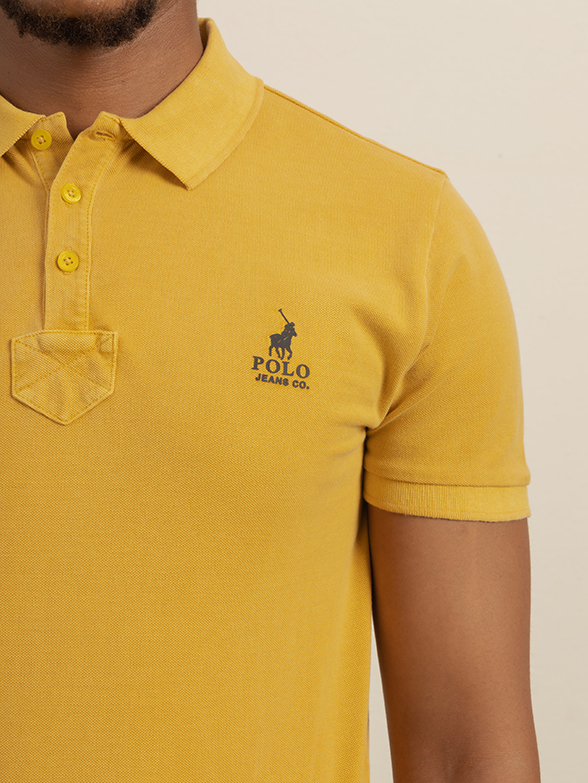 Polo Men’s Overdyed Mustard Short Sleeve Golfer Close Up View
