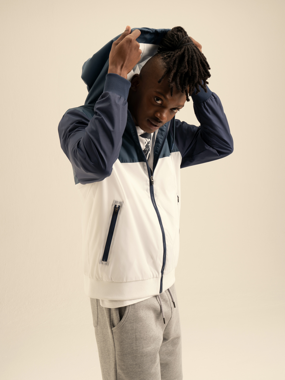 white and black polo jacket